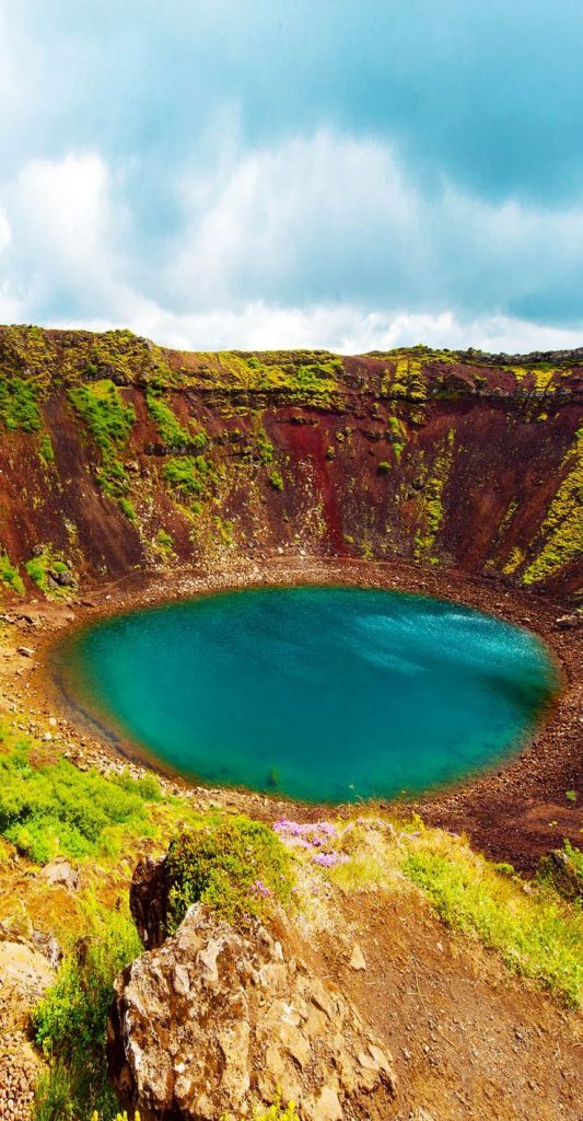 Kerid is a beautiful crater lake of a turquoise color located on the South-West of Iceland