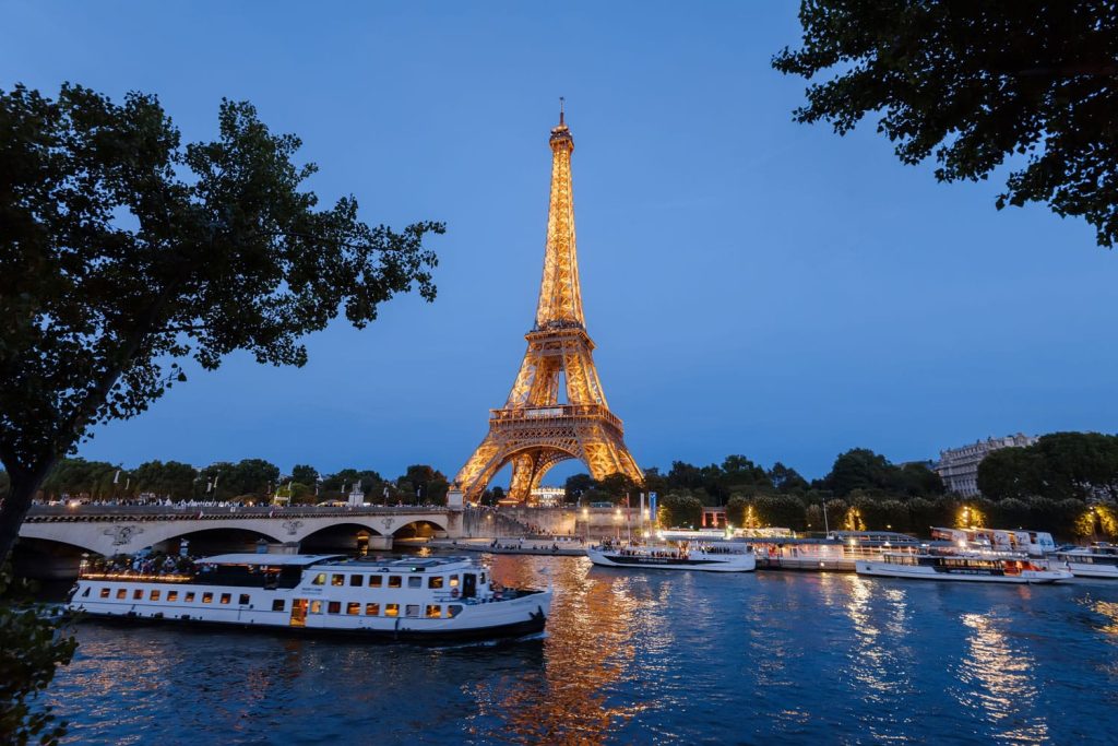 cruise-boat-night-paris-france-shutterstock_702361495